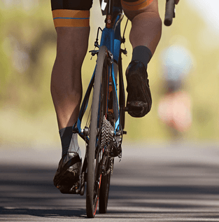 Cyclist rides bike