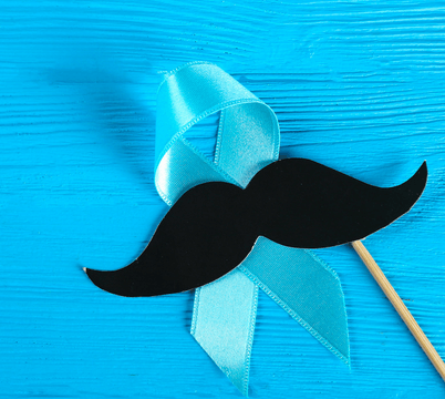 blue men's health awarness ribbon with mustache