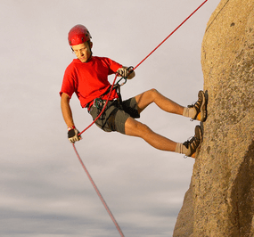 A man mountain climbing
