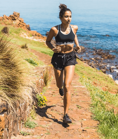 A woman running outdoors