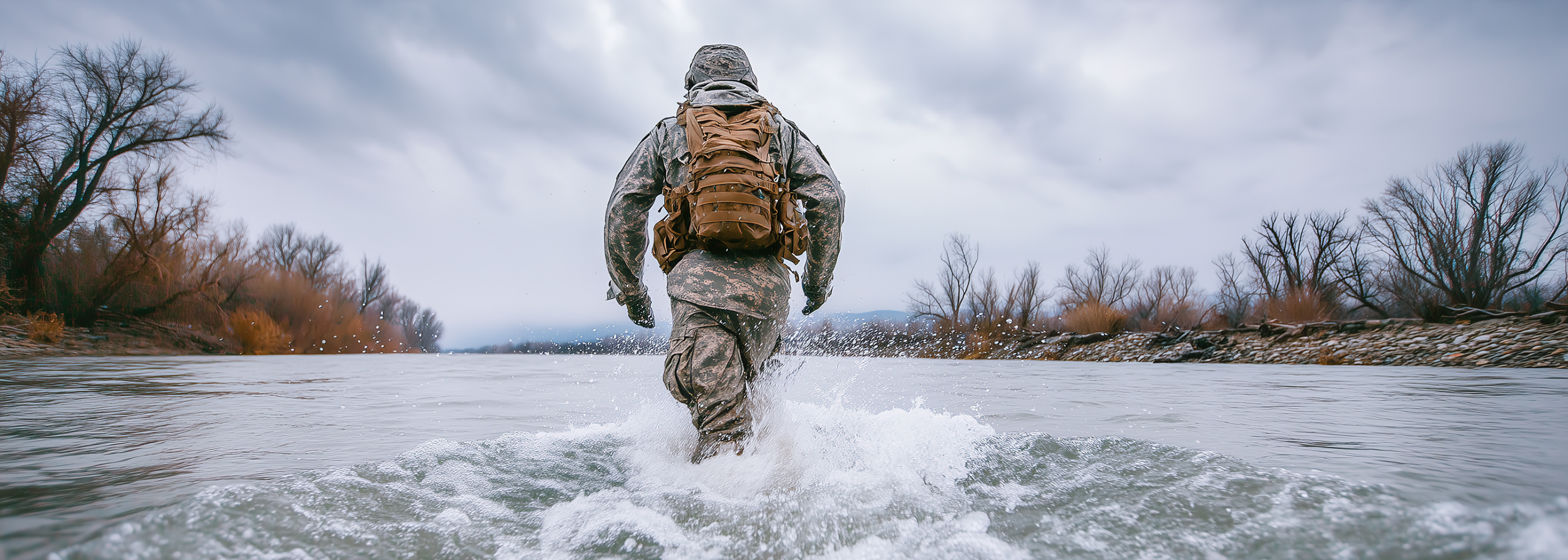 A person marching trough water and wearing Wrightsock Double Layer Military and Tatical Socks