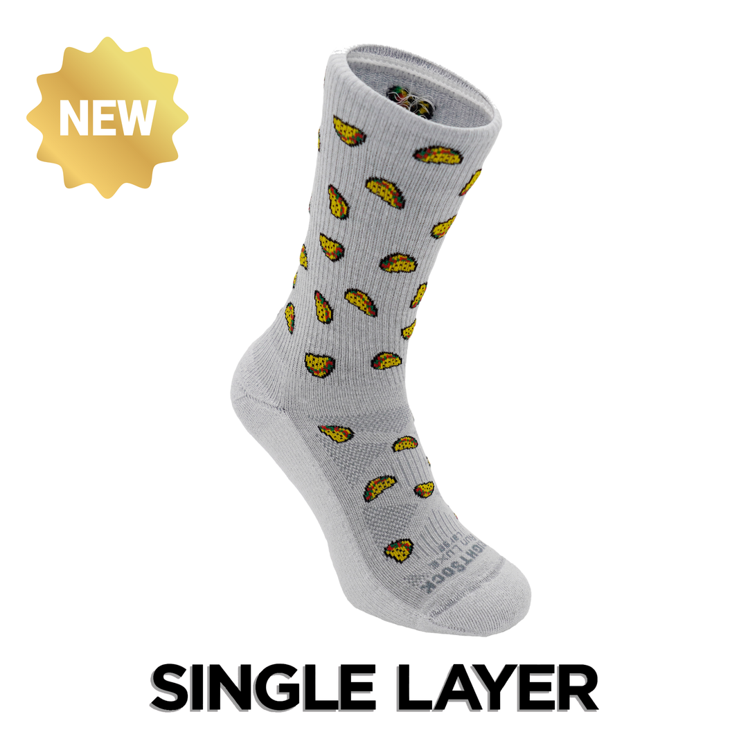 Run Luxe socks, Crew length, light grey/white with taco logos.