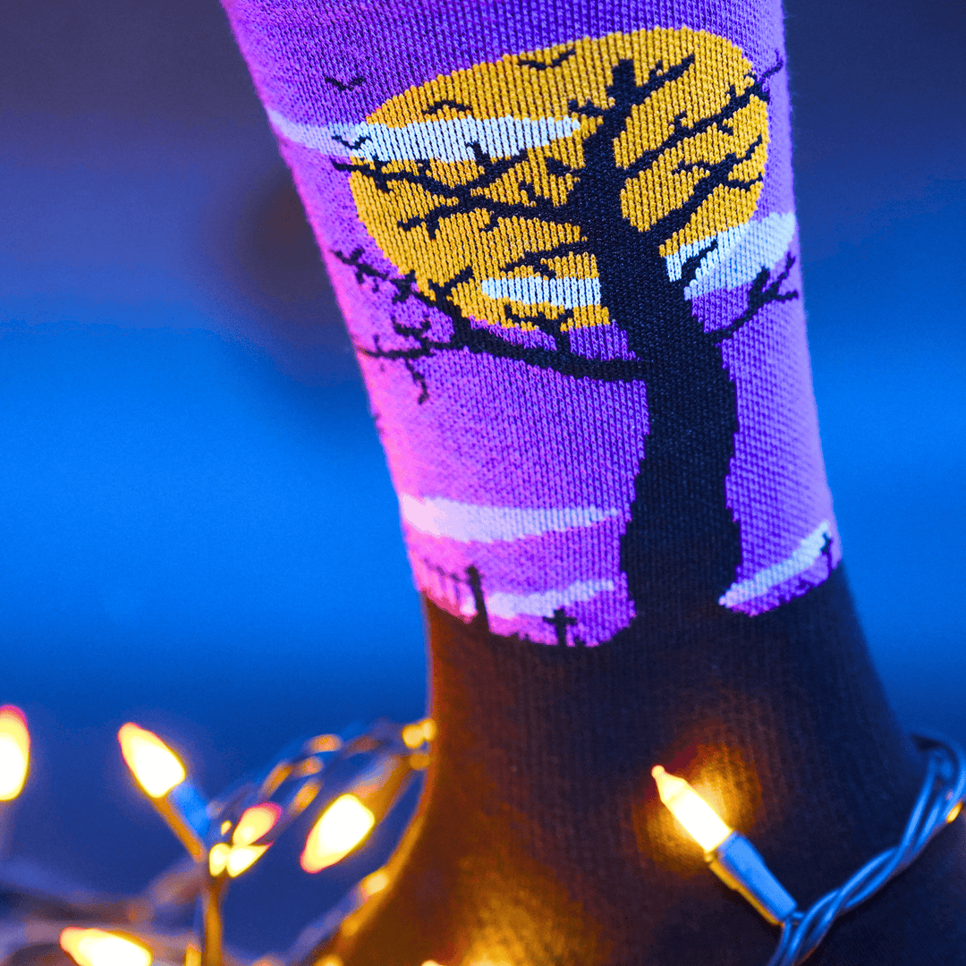 Halloween Night sock surround by lights, close up.