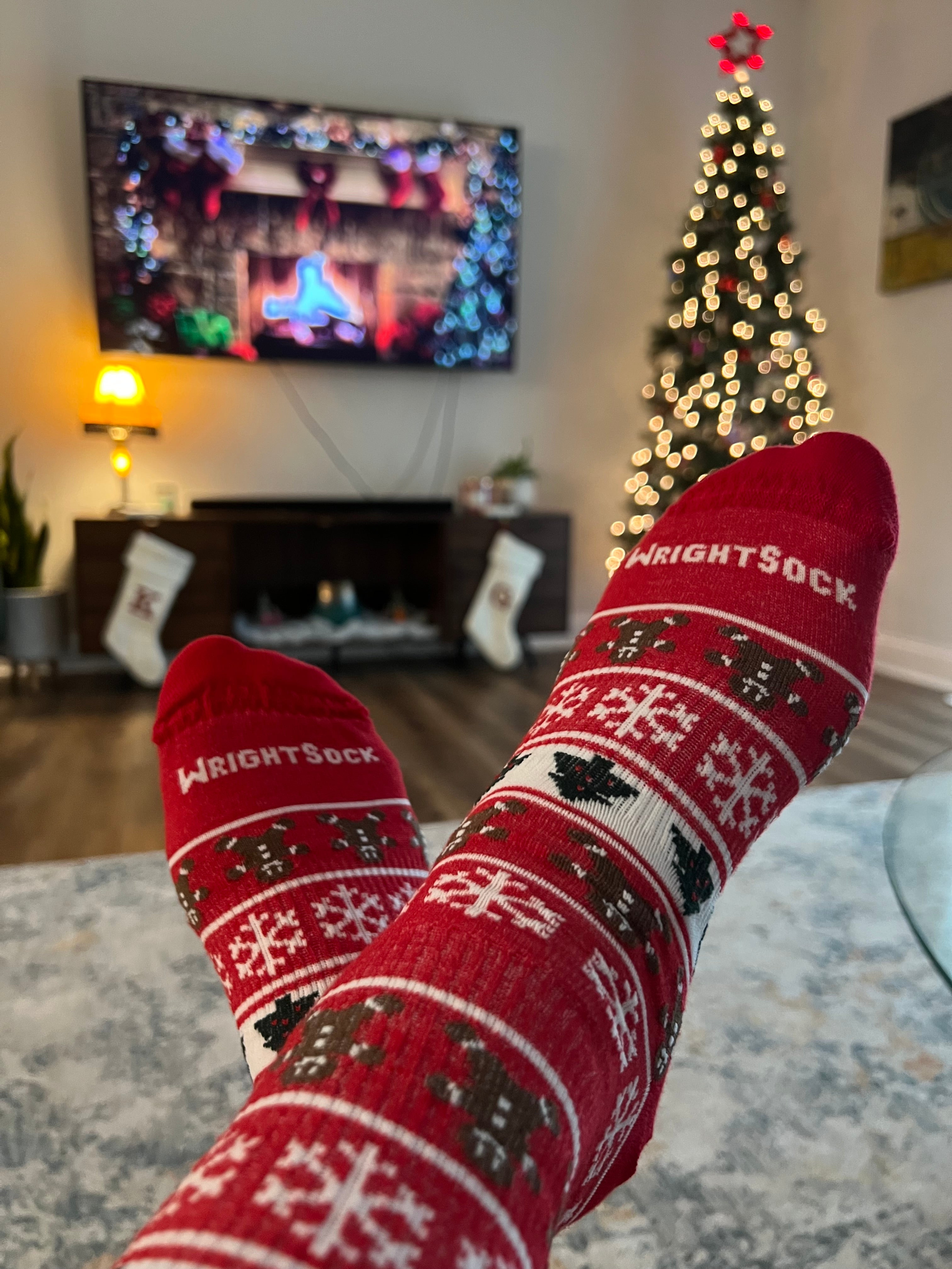 Someone wearing Christmas socks